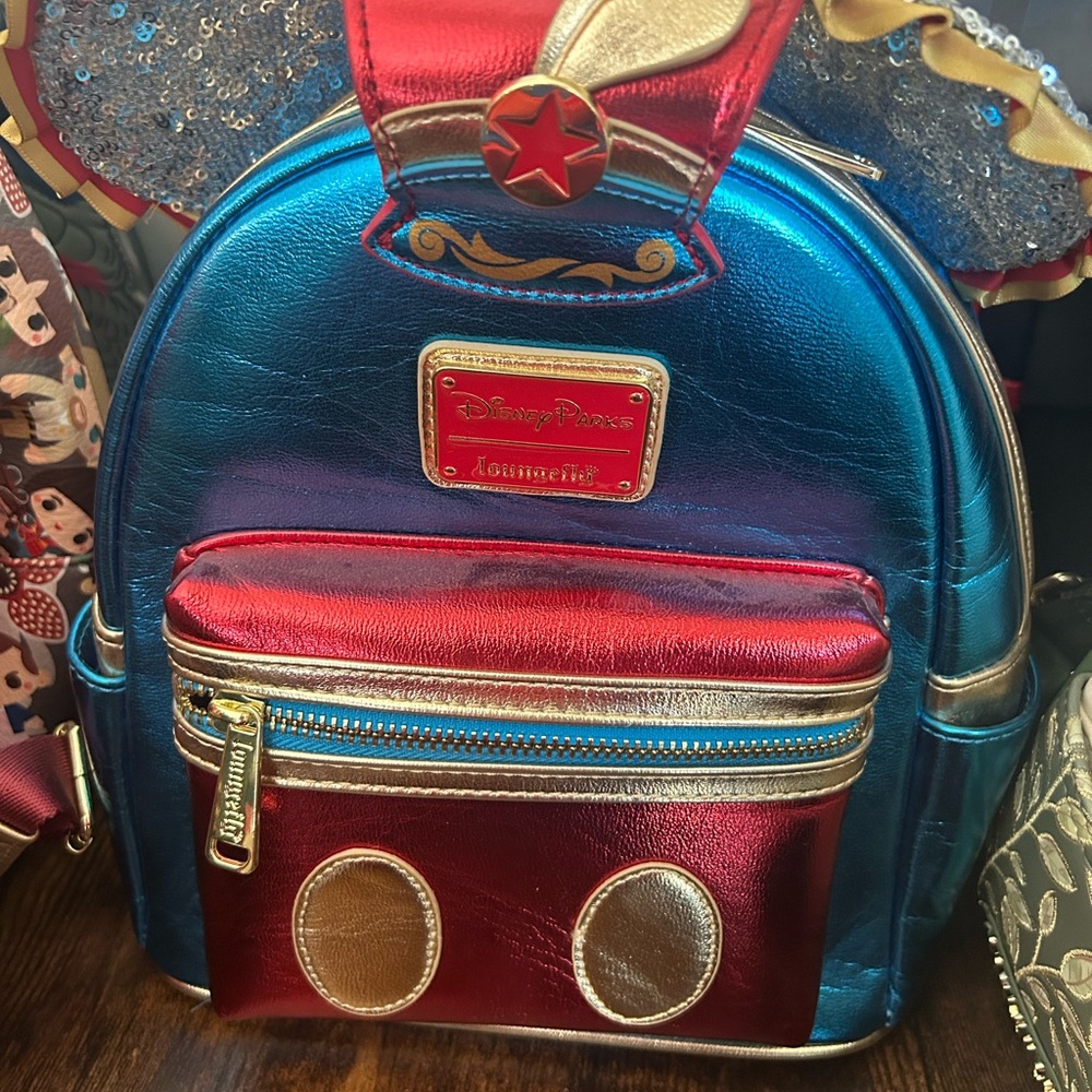 Loungefly Disney Parks Metallic Red and Blue Backpack
